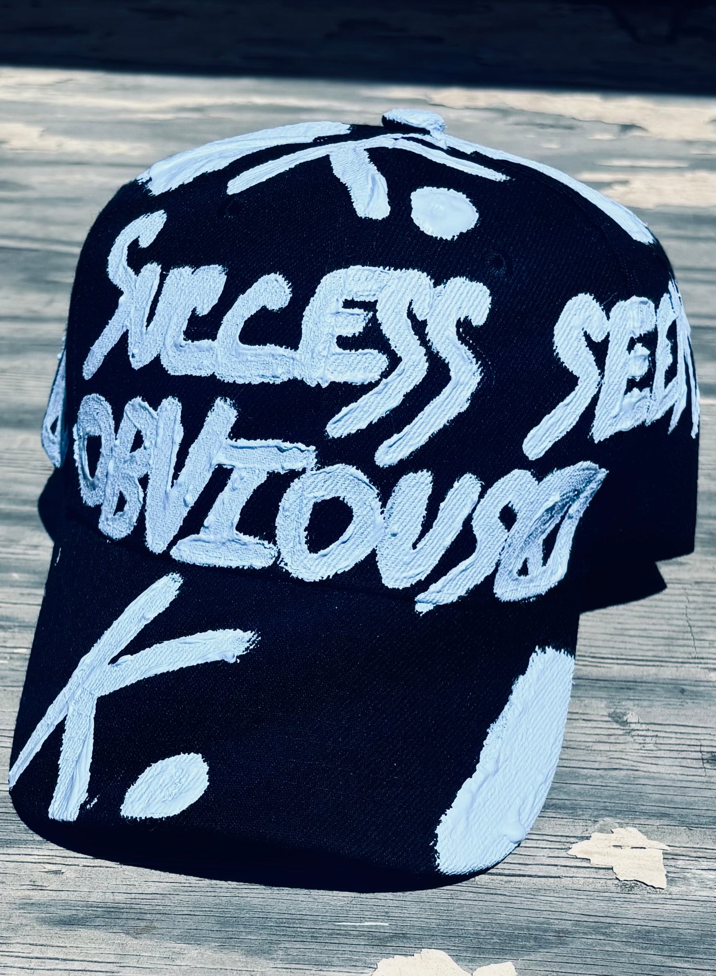 SUCCESS SEEMS OBVIOUS K. HAT