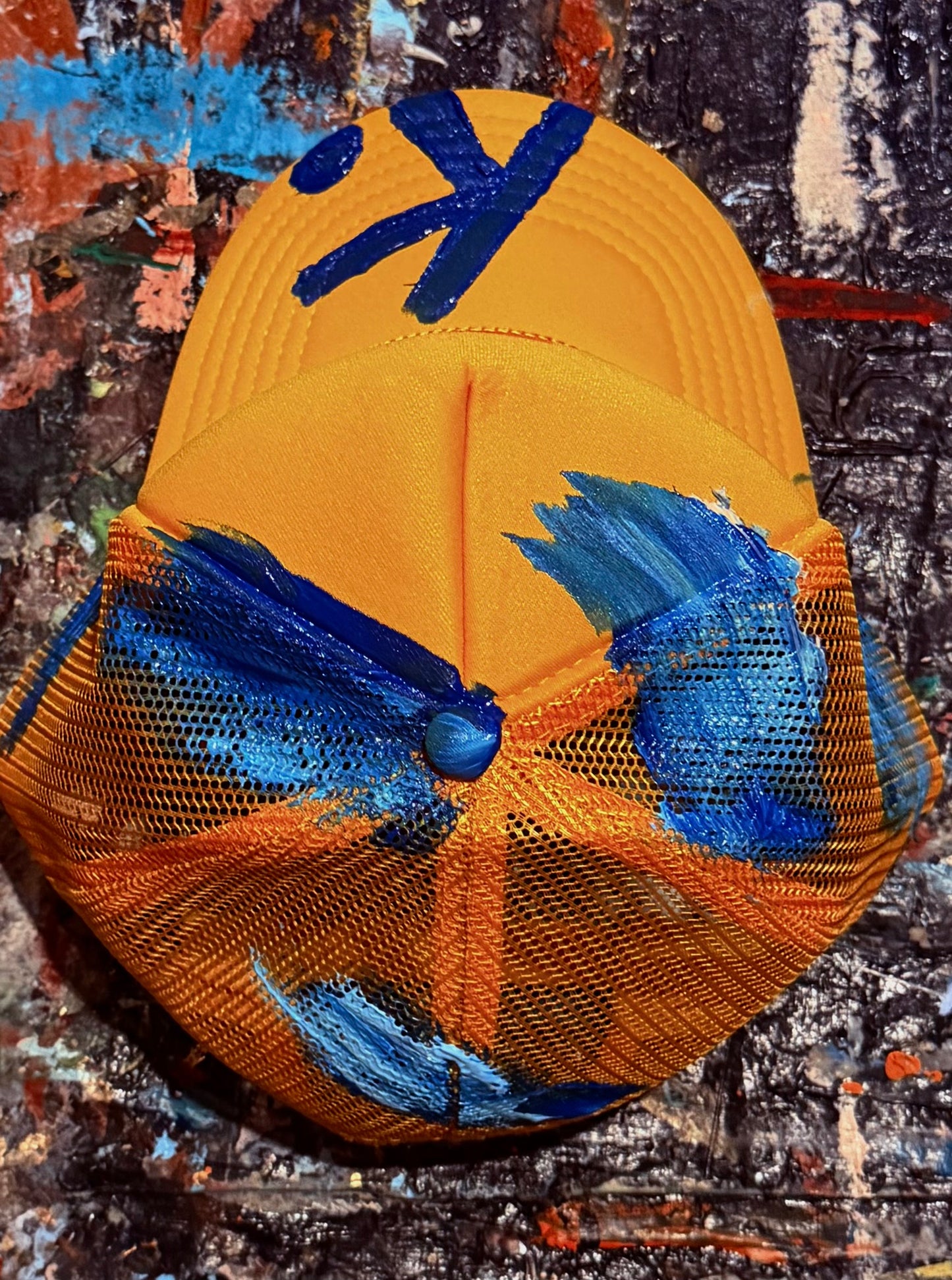 BOASTFUL, SEEMS TO BE K. HAT