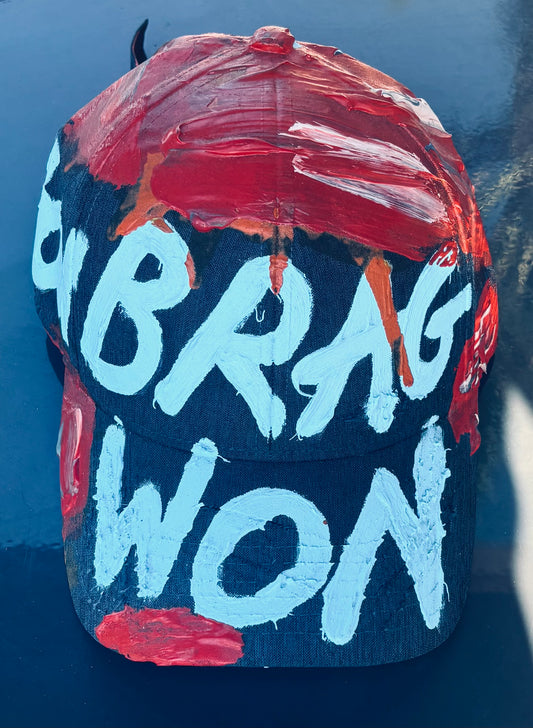 BRAG WON K. HAT
