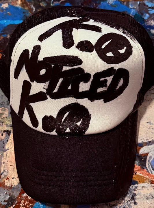 NOTICED BRAGGER K. HAT